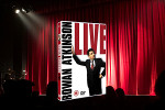 Attend a stand-up comedy night or a live comedy show